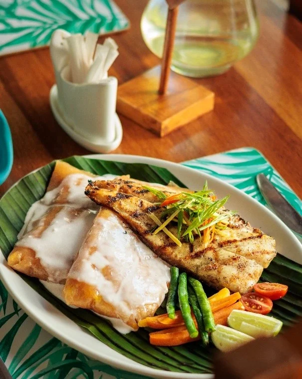 Grilled local fish plated at the Sanctuary Hotel
